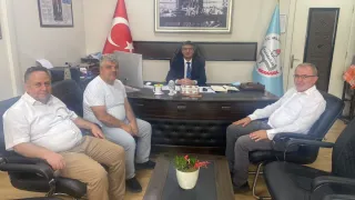 Karabağlar İlçe Milli Eğitim Müdürlüğü’ne Atanan Aydın Yüzbaşıoğlu'nu Makamında Ziyaret Ederek, Tebr
