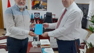 Başkan Dayhan, İzmir İl Defterdarı Şenol Gezer’i Makamında Ziyaret Etti